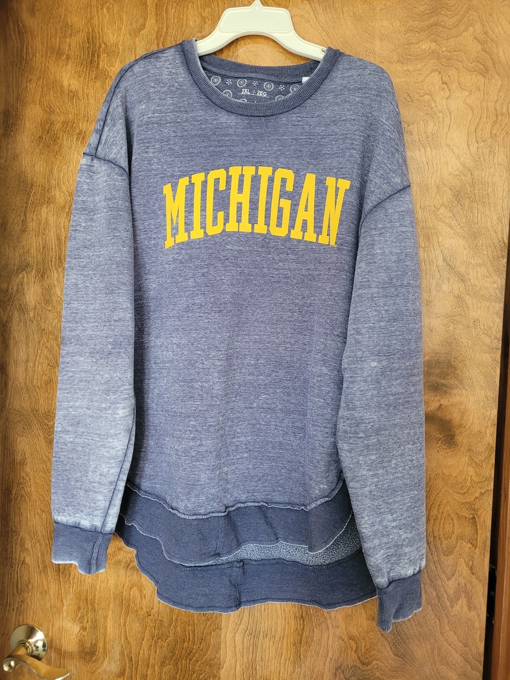Pressbox Distressed Michigan Blue Heather Sweatshirt with Yellow Logo